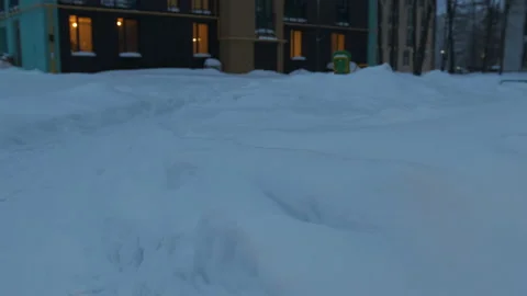 Falling snow falls on the playground. Winter fabulous courtyard Stock Footage 149317526