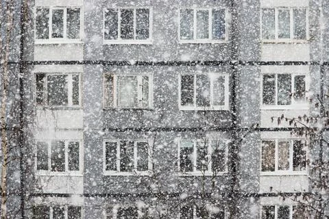 Falling snow flakes during the snowfall from the sky. Stock Photos