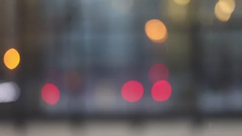 Falling snow flakes winter background blur, lights. view from train window Stock Footage 295989647