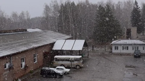 Falling snow in an industrial area. Video stock 118188294