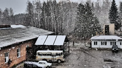 Falling snow in an industrial area. Video stock 118188428