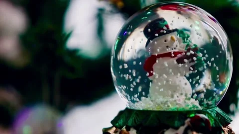 Falling snow inside glass snow globe. Dynamic sparkles, snowflakes Stock Footage 255490192