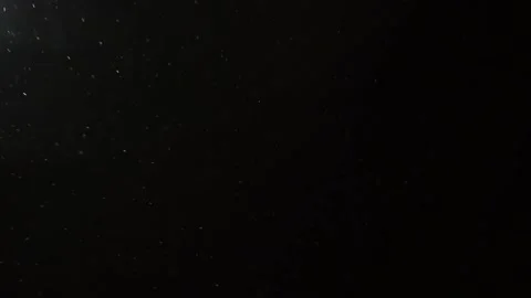 Falling snow in the lantern light . Winter, snowfall, romance Stock Footage 225724764