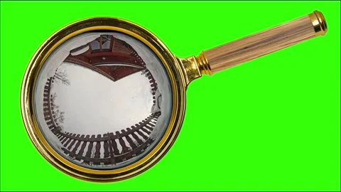 Falling snow on a magnifying glass. Low angle shot. Green screen. Stock Footage 321493908