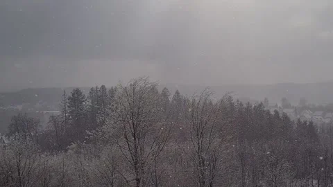 Falling snow over forest and city Luedenscheid, Germany Stock Footage 151652205