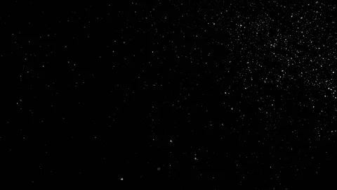 Falling snow particles isolated on black background Stock Footage 125768708