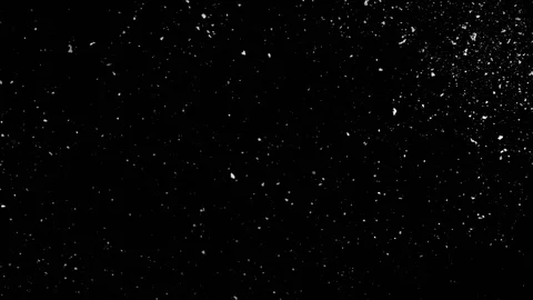 Falling snow particles isolated on black background Stock Footage 125769800