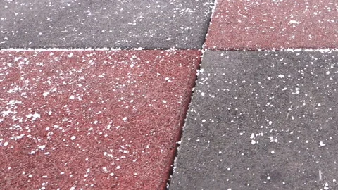Falling snow on the paving slab Video stock 88644436