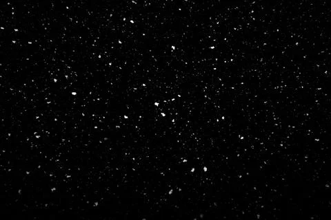 Falling snow texture isolated on black background Stock Photos