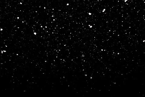 Falling snow texture isolated on black background Stock Photos