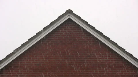 Falling snow with a triangular roof background Video stock 34151059