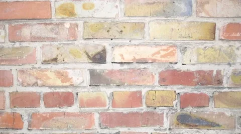 Falling snowflakes against the brick wall Vídeo Stock 60854848
