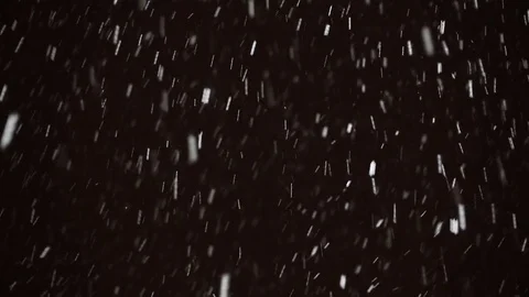 Falling snowflakes on a black background Stock Footage 83817659