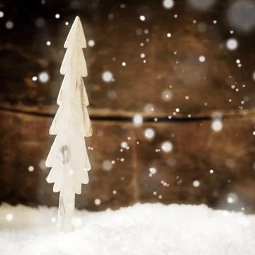 Falling snowflakes on a christmas tree Stock Photos