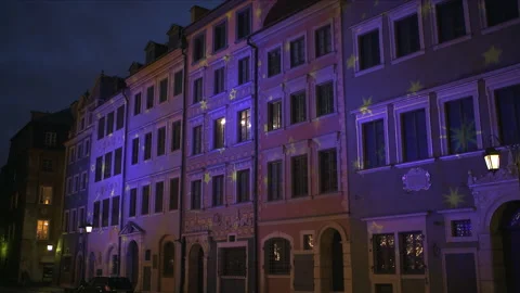 Falling snowflakes laser light show at old town market square of Warsaw Poland Stock Footage 143203011