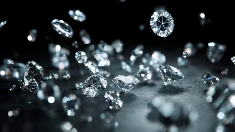 Falling sparkling diamonds cascade gracefully on a black background Stock Footage 315270117