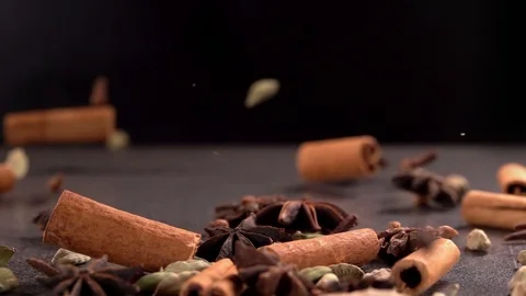 Falling Spices on Black Background Slow Motion Stock Footage 118578606