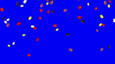 Falling Spinning Jelly Beans on Blue Screen Stock Footage 170944236