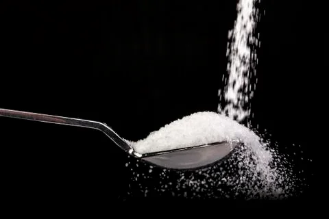 Falling In Spoon Stock Photos