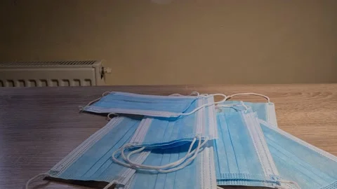  Falling Stack Of Medical Surgical Masks On Table Stock Footage 151899632
