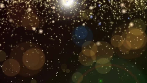 Falling star shower bokeh spots and lens flare on black background Stock Footage 253430736
