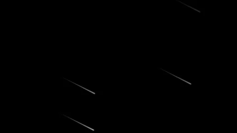 Falling stars or Shooting Star Light Trail on Dark Sky Background Stock Footage 320032736