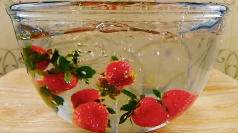 Falling strawberries Stock Footage 211125975