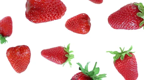Falling strawberries in the studio. Luma included. Stock Footage