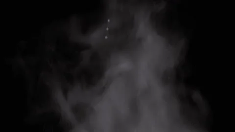 Falling Stream of Splashes on a Rising Cloud of Water Vapor on Black Background Video stock 236191663