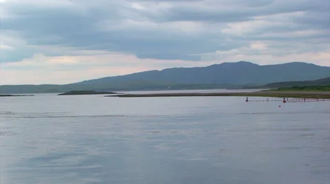 Falling tide water flow out of a loch 스톡 동영상 39654282