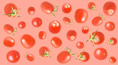 Falling tomato isolated on white background Stock Photos