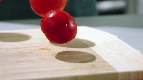 Falling tomato slow motion Stock Footage 169459106