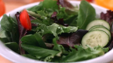 Falling tomatoes in salad Stock-Footage 62280622