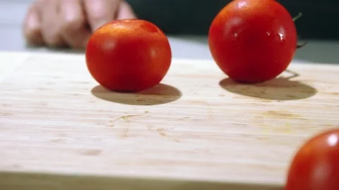 Falling tomatoes slow motion Stock Footage 221187505