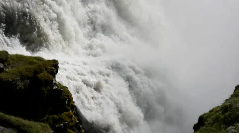 Falling water and rocky cliffs at Gullfoss waterfall, Iceland Stock Footage 33795269