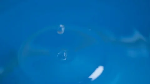 Falling Water drops slow motion,fluid surface tension,nature science Stock Footage 153633402