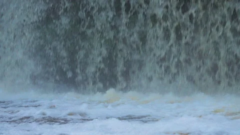 Falling Water Forming Foam and Bubbles Stock Footage 343294744