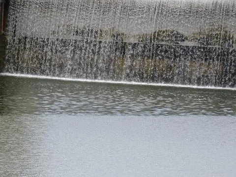 Falling water over spillway – abstract water texture Fotos Stock