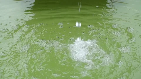 Falling water on the surface in the fountain Stock Footage 159065515
