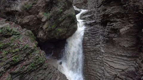 Falling waterfall on mountaun river. Caucasus mountains Stock Footage 168147684