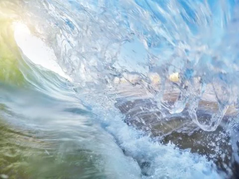 Falling waves during surfing and sunset. Faro Portugal Stock Photos
