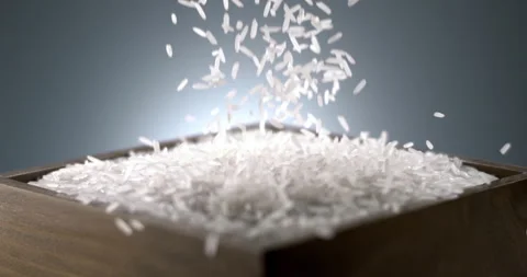 Falling White Rice Creating a Pile Stock Footage 327446470