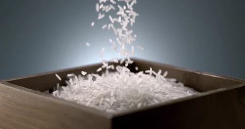 Falling White Rice Creating a Pile Stock Footage 327446490