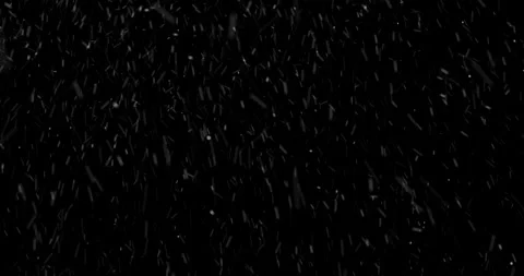 Falling white snow on a black background... | Stock Video | Pond5