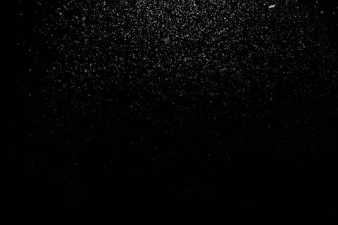 The falling white snow on a black background Stock Illustration