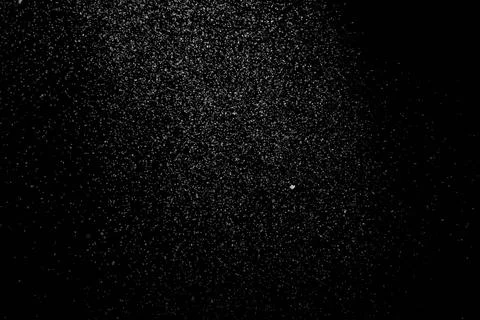 The falling white snow on a black background Stock Illustration