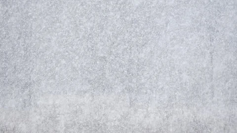 Falling white snowflakes in slow motion. Loop. Stock Footage 258595214