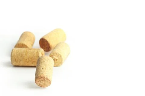 Falling wine bottle caps on a white background 写真素材