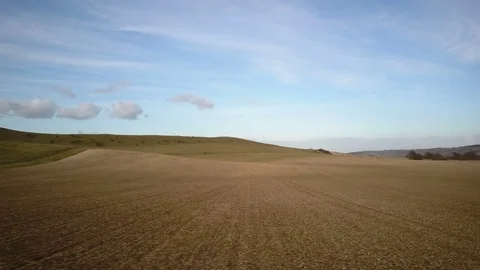 Fallow fields of the Chilterns, England; drone fly-by Video stock 73600825