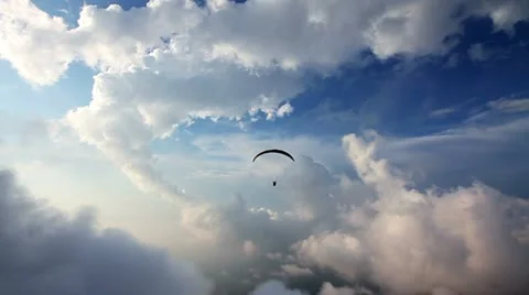 Fallowing Parasailer at the Sky Stock Footage 12703204